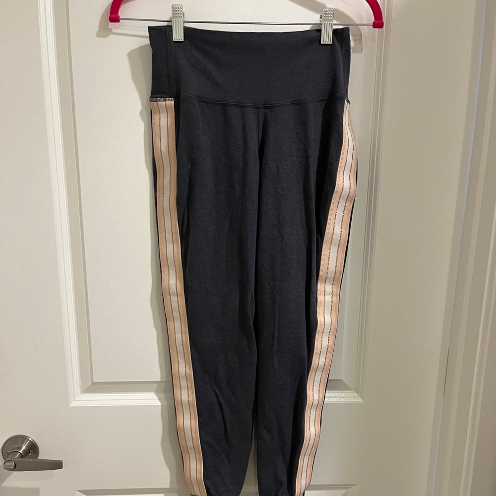 Gray with a peach strip workout pants